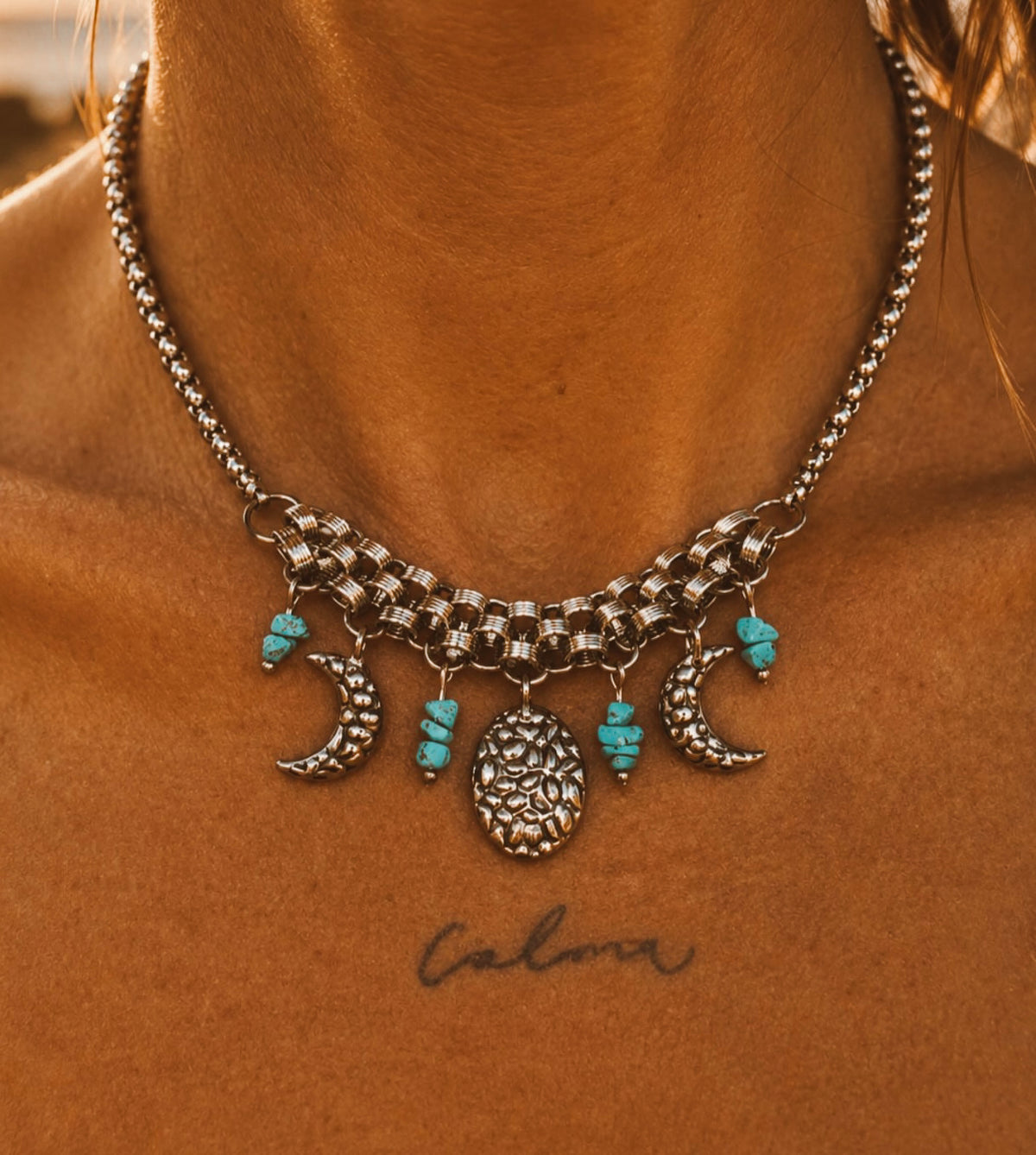 Collar Fases Turquesa.